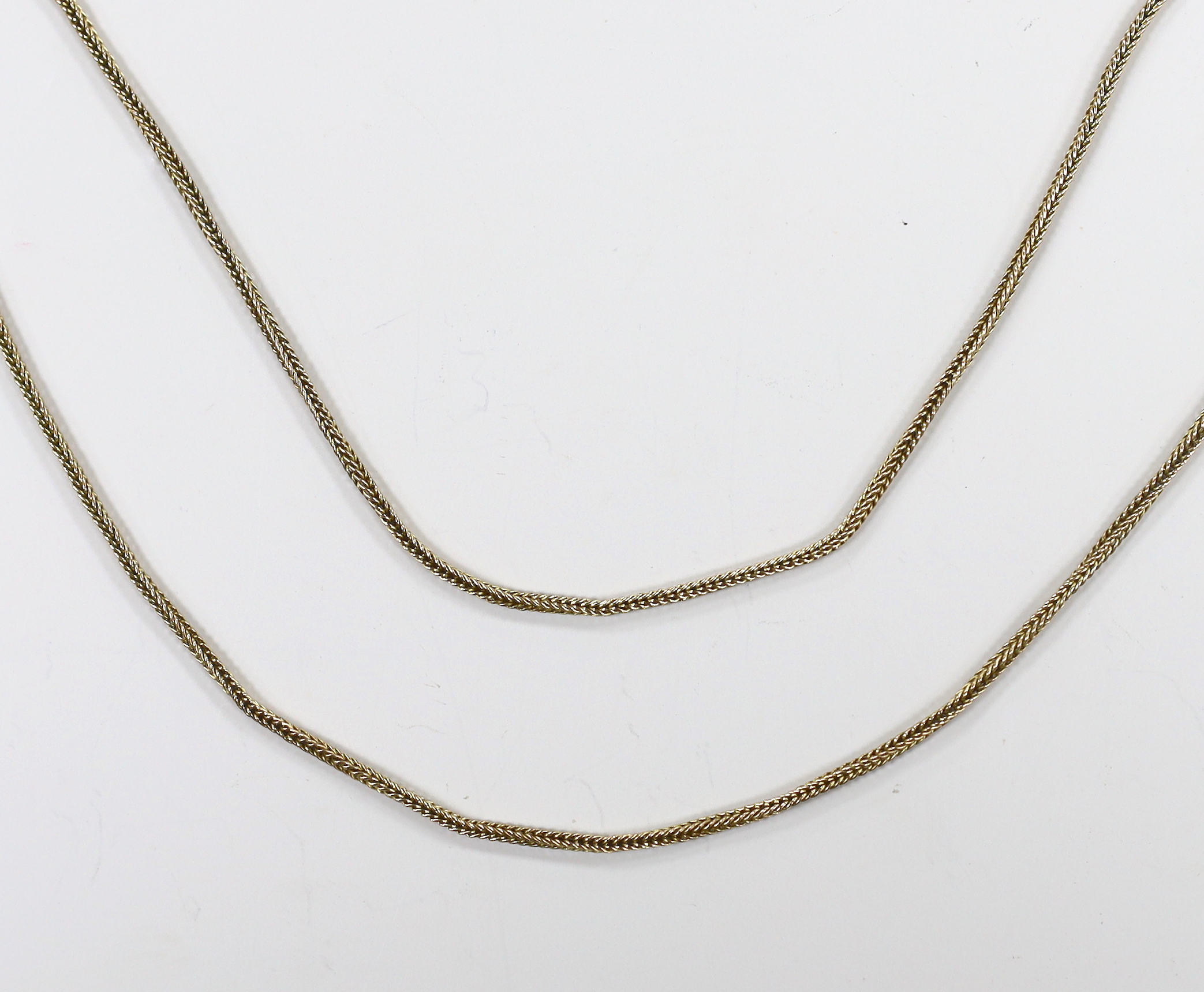 A 19th century yellow metal twin strand guard chain, 80cm, 16.8 grams.